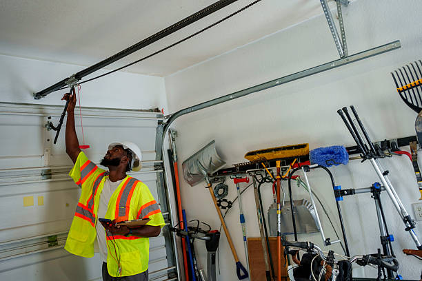 Professional Garage Door Panel Replacement technician working in Clay City, IN